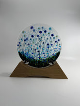 Load image into Gallery viewer, Decorative wall piece with circular design and wooden frame on a white background