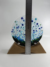 Load image into Gallery viewer, Handmade Fused Glass Round/Disc Blue Flower Ornament in a handmade Oak stand
