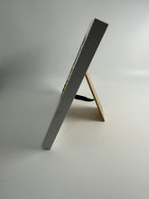 Load image into Gallery viewer, White and Yellow picture in a white frame.
