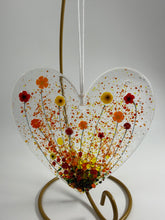 Load image into Gallery viewer, Hanging heart with red, yellow and orange flowers
